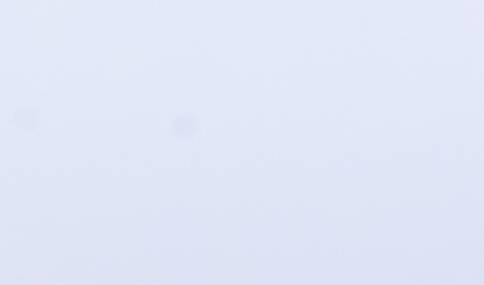 Can you see the dust spot in this part of the sky? It's awfully faint, even with this zoomed-in view - yet spots like this often become glaringly obvious in a print.